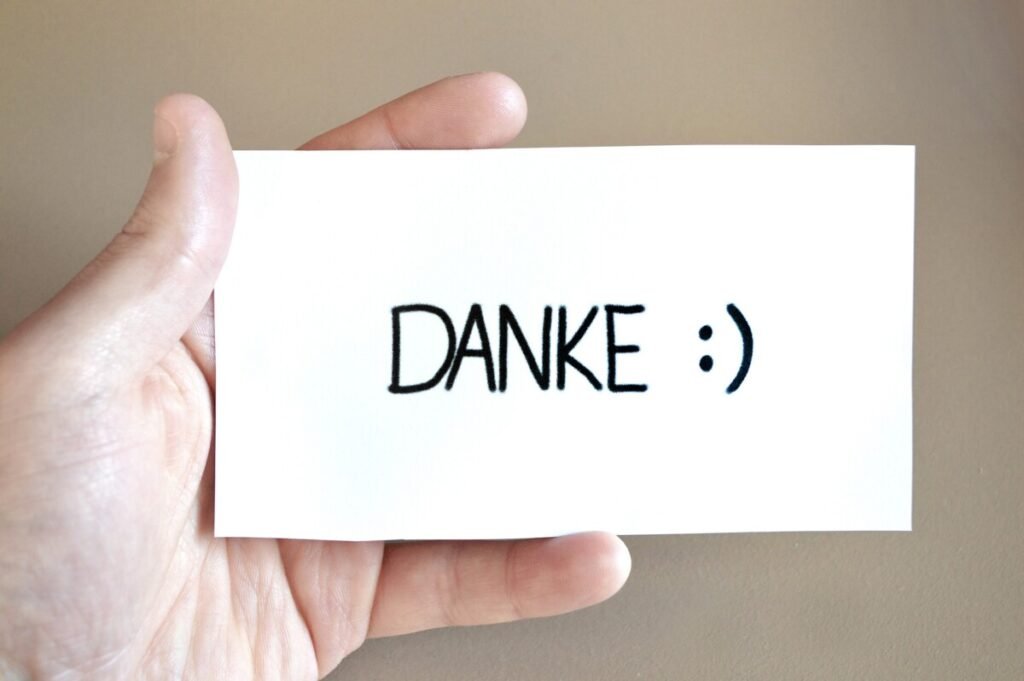 The word Danke written on a piece of paper