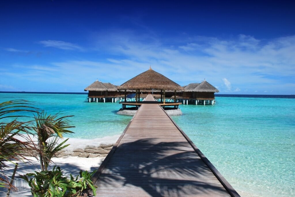 Maldives pier and huts on the sea