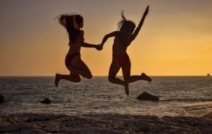 jumping on a beach