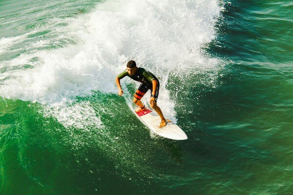 A man on a surfboard