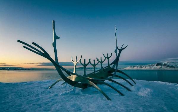 Viking boat perched on a mountain above the water