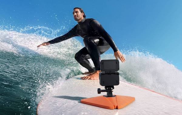 Person on a surfboard with an Ace Pro 2