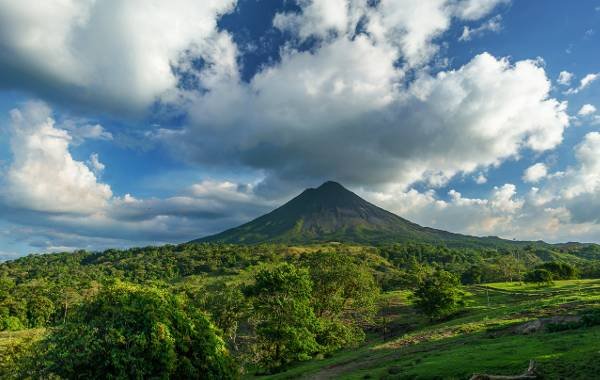 A view of the volcano looking over the treetops in Costa rica