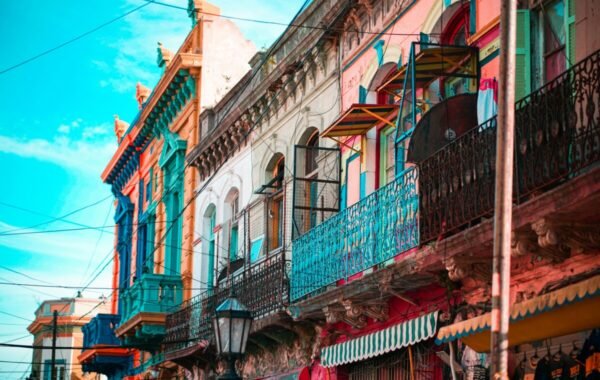 Colorful buildings with ornate balconies in La Boca, Buenos Aires, showcasing the vibrant architecture and cultural charm of Argentina